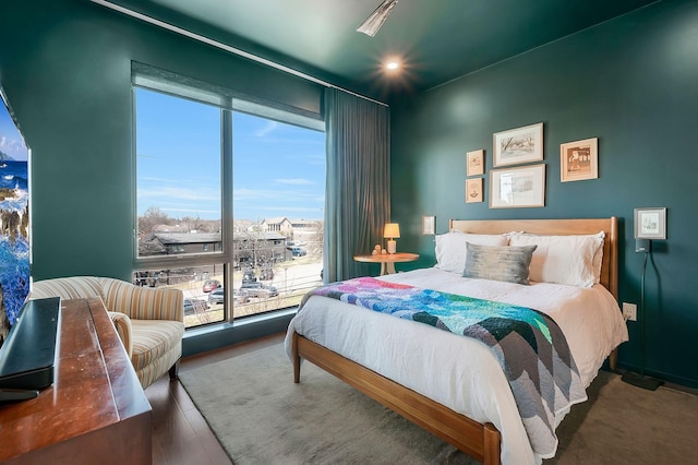 bedroom featuring wood finished floors