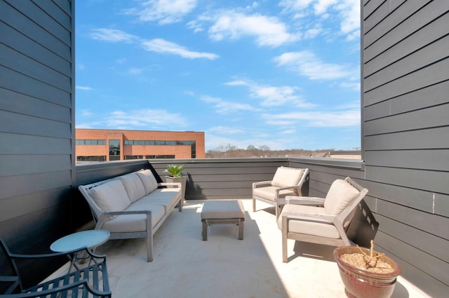 view of patio with an outdoor hangout area and a balcony