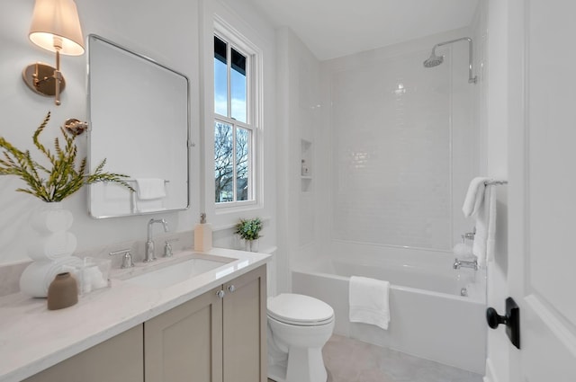 bathroom with vanity, toilet, and washtub / shower combination