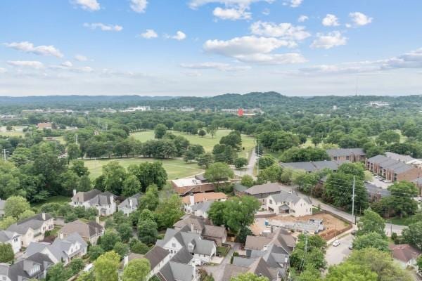 birds eye view of property with a residential view