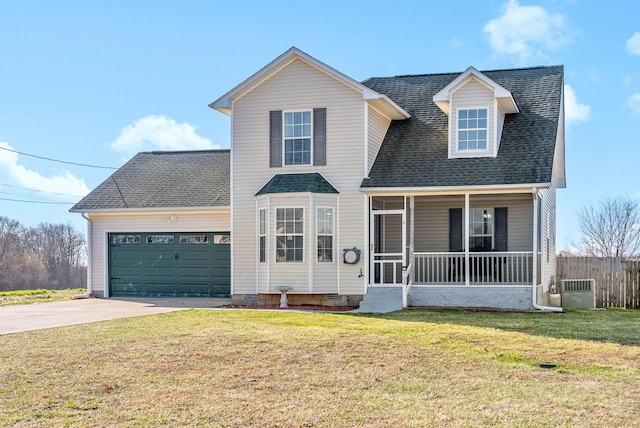 view of front facade with a shingled roof, covered porch, concrete driveway, a front yard, and an attached garage