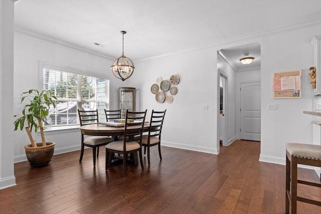 dining room featuring baseboards, a notable chandelier, ornamental molding, and dark wood-style flooring