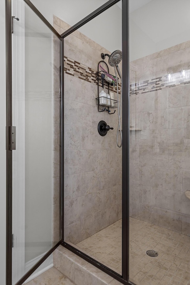 bathroom with a stall shower