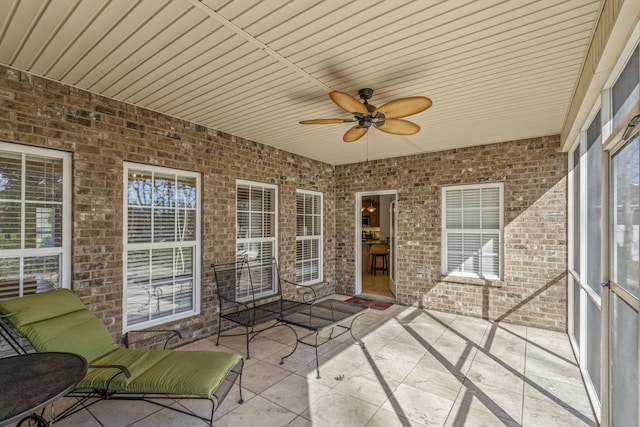 view of patio featuring a ceiling fan