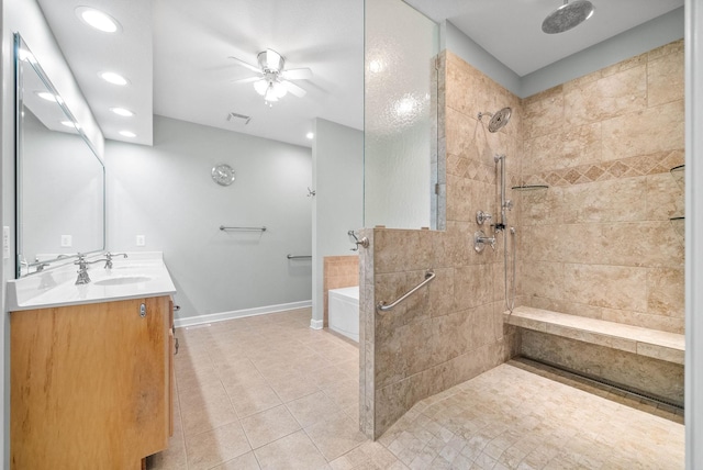 full bath with visible vents, ceiling fan, a garden tub, a tile shower, and vanity