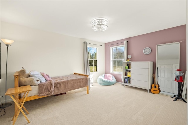 bedroom featuring carpet