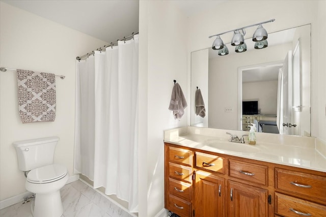 bathroom featuring toilet, marble finish floor, curtained shower, baseboards, and vanity