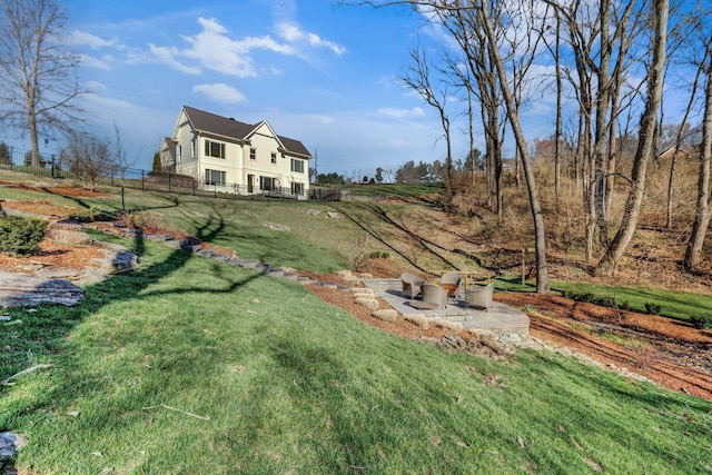 view of yard featuring a patio area and fence