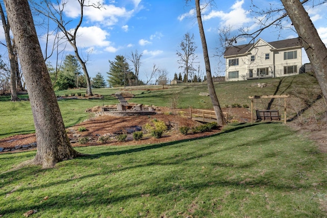 view of yard featuring a rural view and fence