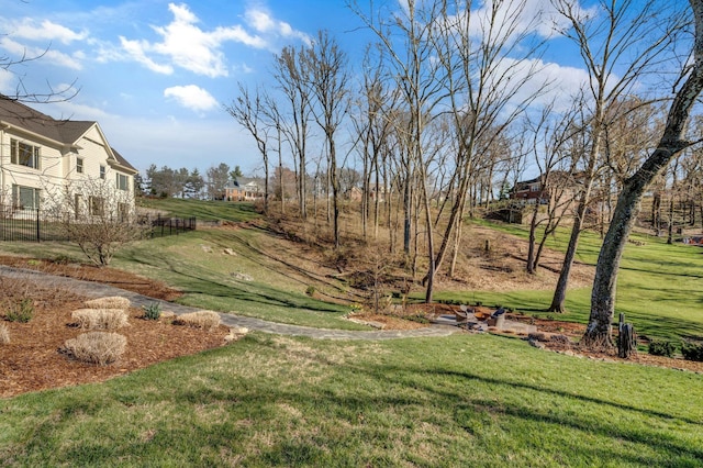 view of yard featuring fence