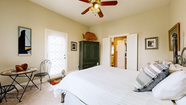 bedroom with baseboards, light colored carpet, and a ceiling fan