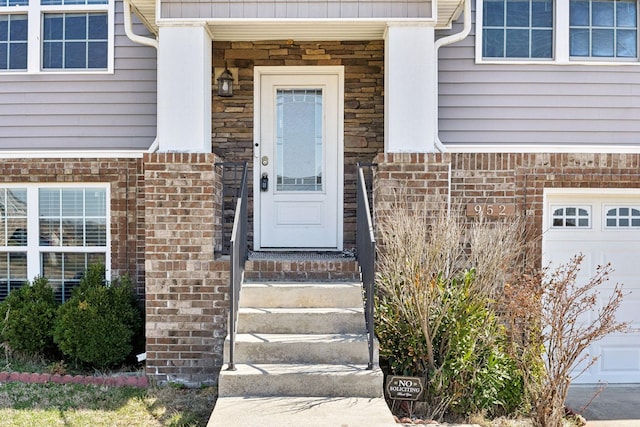 property entrance with a garage