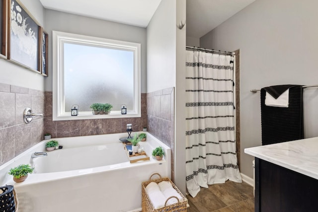 full bathroom with a wealth of natural light, a shower with shower curtain, and a bath