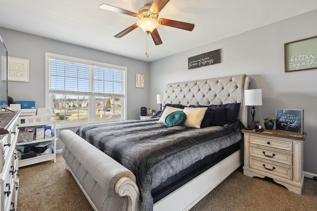 carpeted bedroom with a ceiling fan