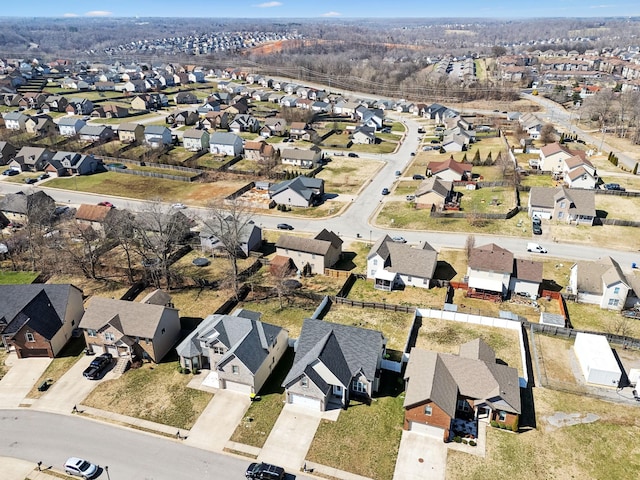 birds eye view of property with a residential view