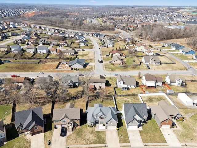 birds eye view of property with a residential view