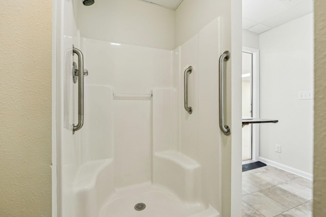 334 Idaho Springs Rd, Clarksville, TN 37043 - full bath with a drop ceiling, a stall shower, and baseboards