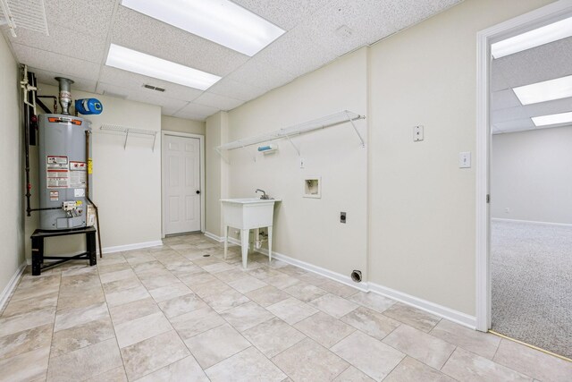334 Idaho Springs Rd, Clarksville, TN 37043 - laundry area with visible vents, water heater, hookup for an electric dryer, hookup for a washing machine, and laundry area