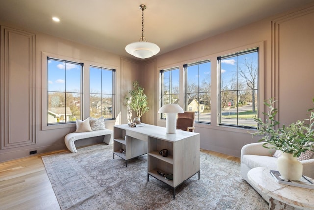 office featuring light wood-style flooring, recessed lighting, and baseboards