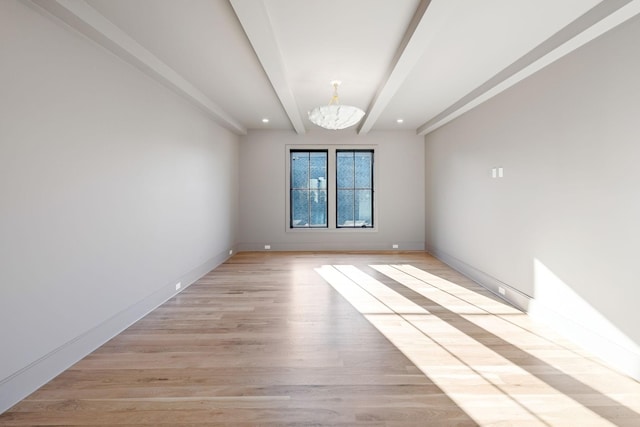 unfurnished room with baseboards, recessed lighting, beamed ceiling, light wood-type flooring, and a chandelier