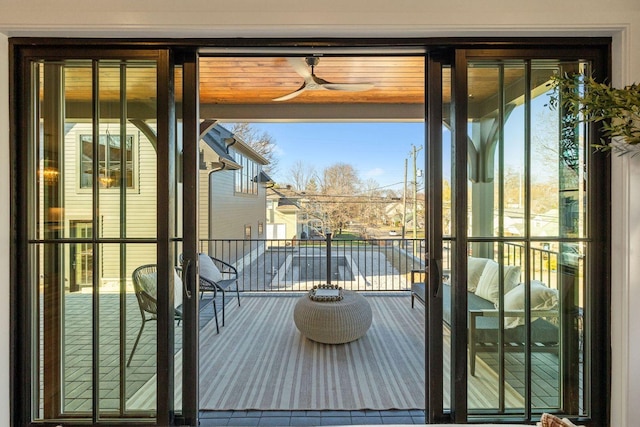 balcony featuring ceiling fan