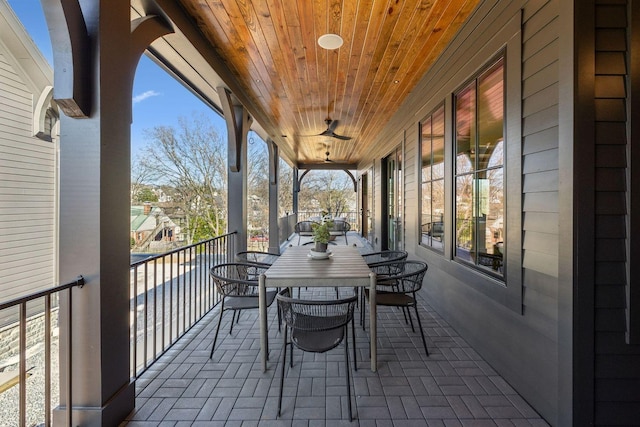 exterior space with ceiling fan and outdoor dining space