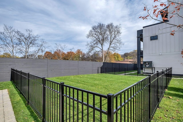 view of yard with a fenced backyard