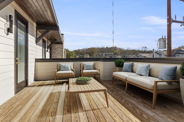 wooden deck featuring outdoor lounge area