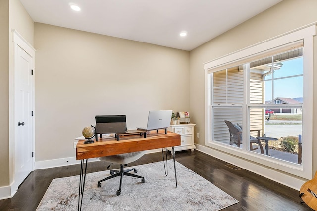 office space with recessed lighting, baseboards, and dark wood-style flooring