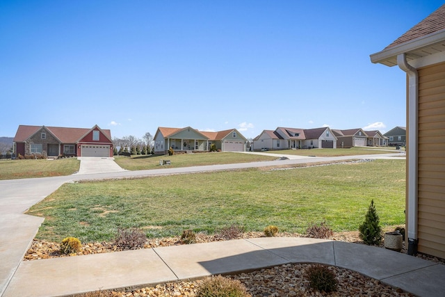 view of yard featuring a residential view