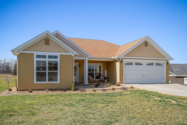 view of front facade with driveway, a front lawn, and a garage