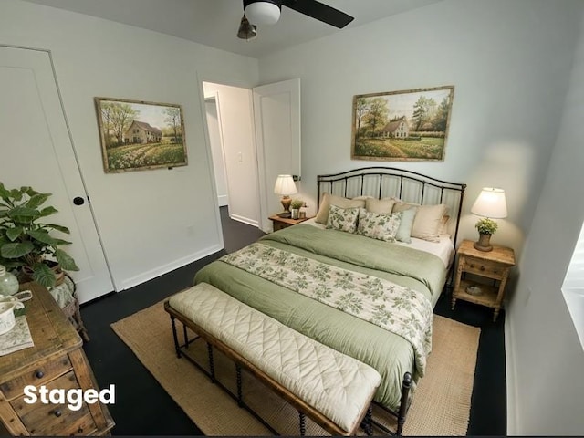 bedroom featuring baseboards and a ceiling fan