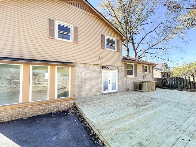 wooden deck with french doors and fence