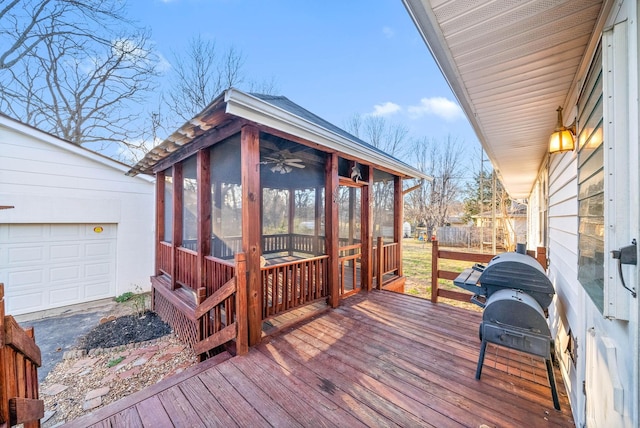 deck with fence, a sunroom, and a grill