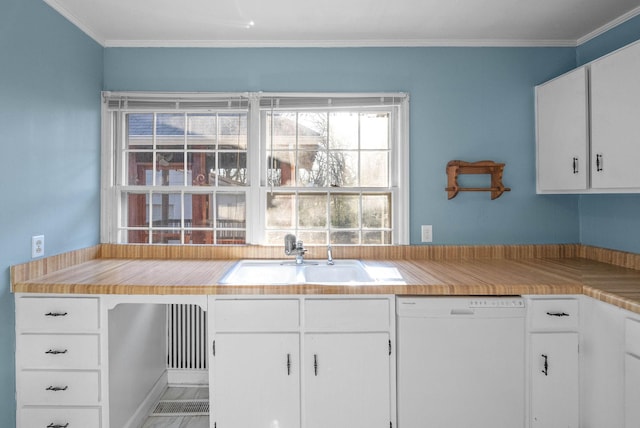 kitchen featuring a sink, white cabinets, and white dishwasher