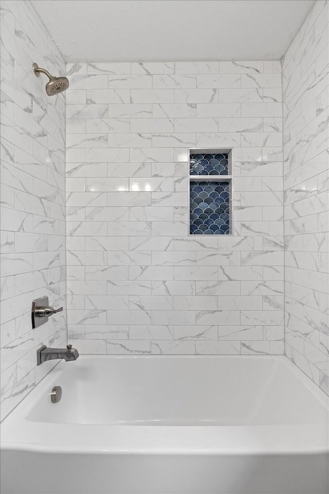 full bathroom featuring tub / shower combination