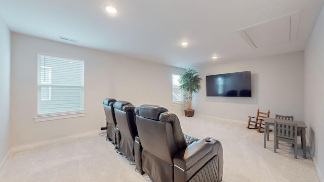 home theater featuring visible vents, recessed lighting, light colored carpet, and baseboards