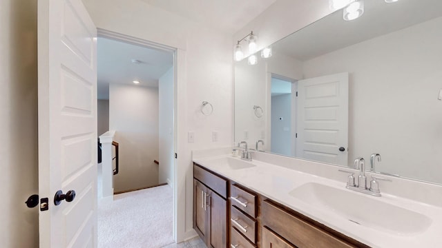 bathroom featuring double vanity and a sink