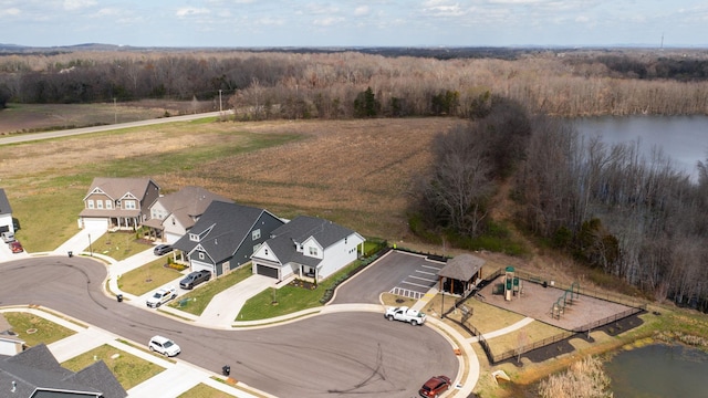 birds eye view of property featuring a residential view and a water view