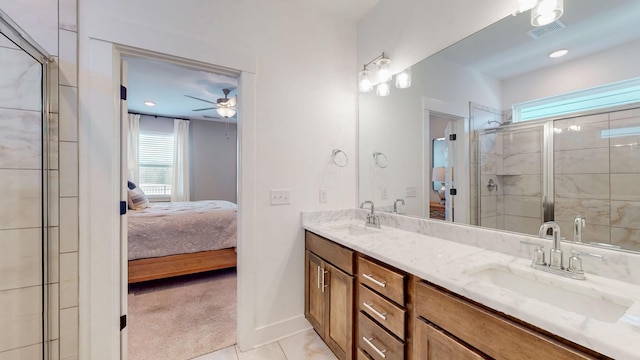 full bath featuring visible vents, a shower stall, ensuite bath, and a sink