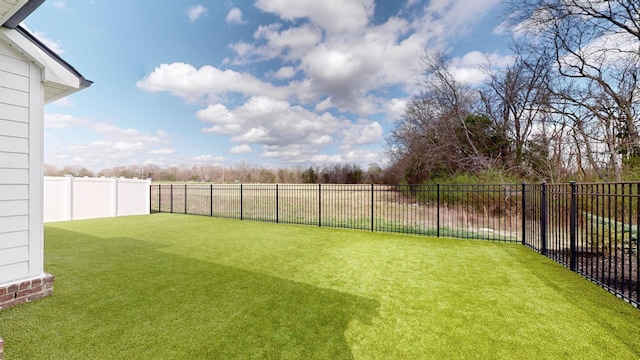 view of yard featuring a fenced backyard