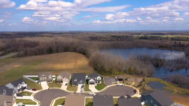 bird's eye view featuring a residential view and a water view