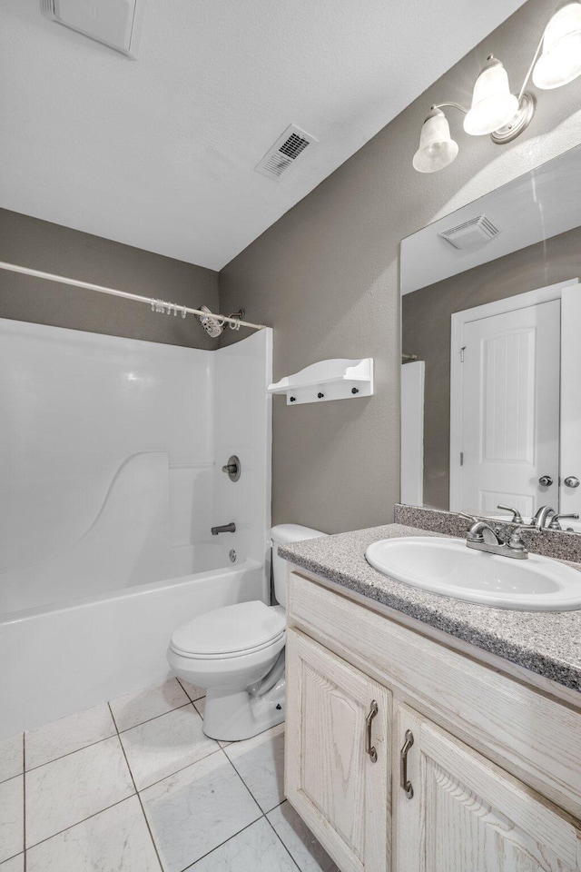 full bathroom featuring vanity, toilet, visible vents, and shower / washtub combination