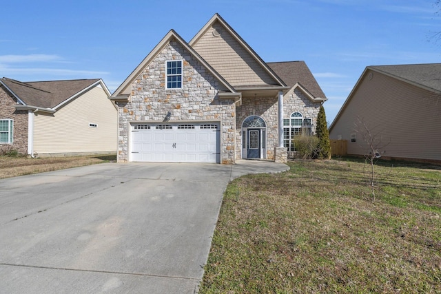 view of front of property with concrete driveway, a garage, stone siding, and a front yard