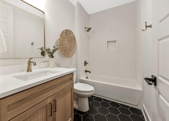 full bathroom featuring shower / bathtub combination, toilet, vanity, and tile patterned flooring