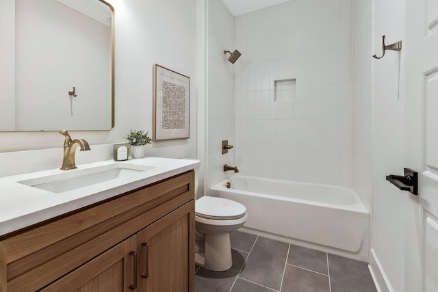 bathroom with tile patterned flooring, toilet, vanity, and shower / bath combination