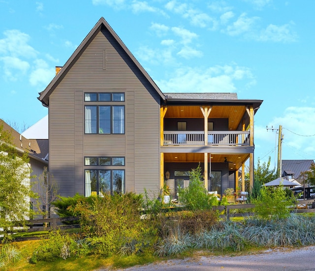 rear view of house with a balcony