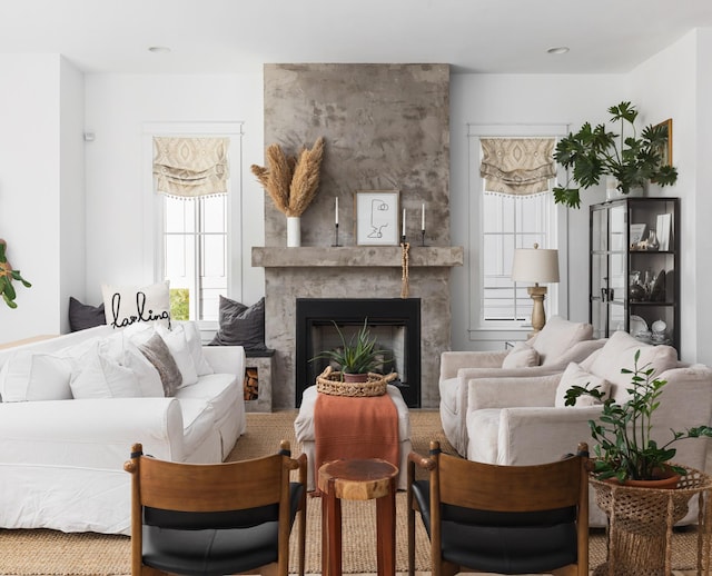 living room with a large fireplace