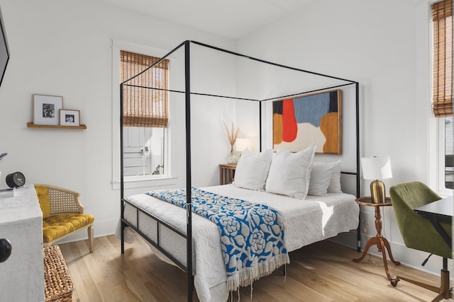 bedroom featuring wood finished floors