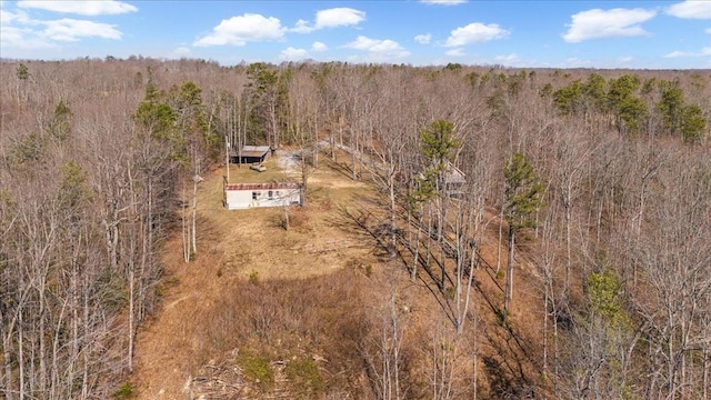 bird's eye view featuring a forest view